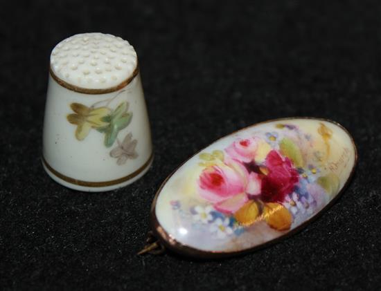 Royal Worcester puce mark thimble and a gold mounted brooch